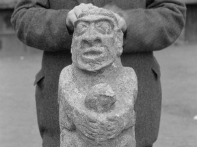 "Sechelt Image" stone Indian artifact discovered at Selma Park in Sechelt, 1921. Stuart Thomson Vancouver Archives AAM1535-: CVA 99 - 3382.