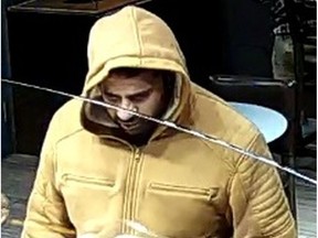 Vancouver police have released security photos of one of the suspects in a violent home invasion in Vancouver last year.