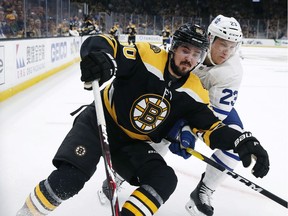 Boston Bruins' Marcus Johansson (90) and Toronto Maple Leafs' Travis Dermott (23) vie for the puck during the second period in Game 5 of an NHL hockey first-round playoff series in Boston, Friday, April 19, 2019. Johansson signed with the Buffalo Sabres as a free agent on the weekend.