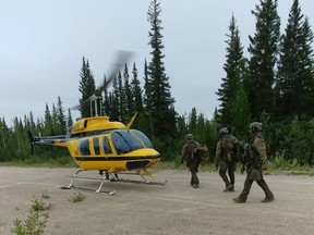 RCMP search the area near Gillam, Man. in this photo posted to their Twitter page on Friday, July 26, 2019.