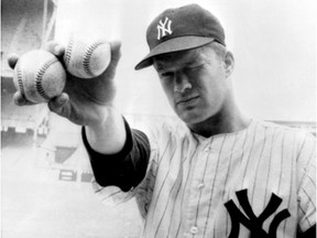In this Oct. 14, 1964 file photo, New York Yankees pitcher Jim Bouton takes aim as he holds two balls in the right hand that his teammates hope will lead them to victory in the sixth World Series game in New York. Jim Bouton, the New York Yankees pitcher who shocked the conservative baseball world with the tell-all book "Ball Four," has died, Wednesday, July 10, 2019. He was 80. ORG XMIT: NY163 [PNG Merlin Archive]
