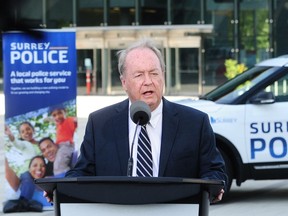 Mayor Doug McCallum with a prototype of a new Surrey Police vehicle after presenting his State Of The City address at Surrey City Hall in May.