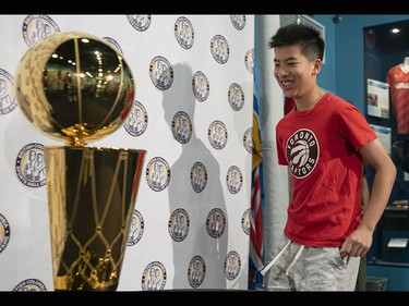 Tomson Lui is excited to see the Larry O'Brien NBA Championship Trophy up close at the B.C. Sports Hall of Fame in Vancouver on Tuesday, July 23.