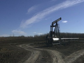 An oil rig and flare pit on the Blueberry River First Nation.