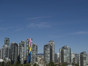 Condo towers line the north shore of False Creek in Vancouver.