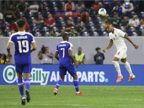 Defender Derek Cornelius, right, back from duties with Canada's national team, will try to inject a spark into the Vancouver Whitecaps' lineup Saturday night.