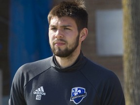 Current Whitecaps goalkeeper Maxime Crépeau heads to a training session with the Montreal Impact in 2016.