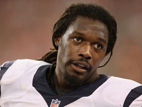 Jadeveon Clowney of the Houston Texans, the top pick in the 2014 NFL draft, stands on the sidelines during a 2014 NFL pre-season game in Glendale, Ariz.