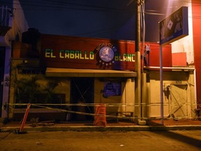 The Caballo Blanco bar (White Horse bar), where 23 people were killed by a fire, is seen cordoned off, in Coatzacoalcos, Veracruz State, Mexico, on Wednesday, Aug. 28, 2019.
