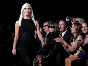 Donatella Versace walks down the catwalk after her Versace presentation in New York City on Dec. 2, 2018.