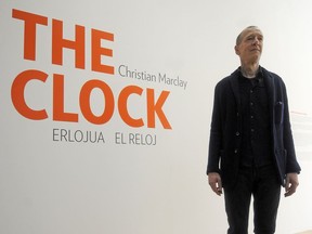 U.S. artist Christian Marclay poses after the presentation of his film The Clock at the Guggenheim Museum in the northern Spanish Basque city of Bilbao on March 6, 2014.