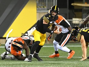 The Tiger-Cats have relied on backup quarterback Dane Evans, centre, in the absence of Jeremiah Masoli. He has gone 3-1 as a starter.