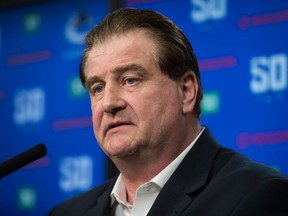 Vancouver Canucks General Manager Jim Benning responds to questions during a news conference after the NHL hockey team signed defenceman Tyler Myers to a five-year contract, in Vancouver, on Monday July 1, 2019. Photo: Darryl Dyck/CP