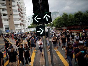 People take part in the "Reclaim Hung Hom and To Kwa Wan, Restore Tranquility to Our Homeland" demonstration against the extradition bill in To Kwa Wan neighborhood, Hong Kong, China August 17, 2019.