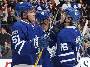 Mitchell Marner of the Toronto Maple Leafs celebrates with Jake Gardiner against the Montreal Canadiens on January 7, 2017 in Toronto. (Claus Andersen/Getty Images)