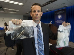 Combined Forces Special Enforcement Unit of B.C. Insp. Duncan Pound addresses the media Thursday, May 9, 2019 regarding a 30-day project named Para Bellum. The operation targeted gangs in Surrey and Abbotsford and began in March.