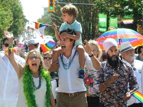 Canadian Prime Minister Justin Trudeau with son, Hadrian, federal Green party leader Elizabeth May and federal NDP leader Jagmeet Singh at the 2019 Vancouver Pride Parade.