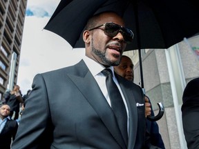 R. Kelly leaves the Cook County courthouse after a hearing on multiple counts of criminal sexual abuse case, in Chicago on March 22, 2019.