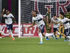 Vancouver Whitecaps forward Theo Bair (50) celebrates after a specacular goal during the first half against the Portland Timbers at Providence Park.