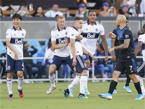 Vancouver Whitecaps right back Jake Nerwinski (28) is congratulated after scoring a goal against the San Jose Earthquakes during the first half at Avaya Stadium.