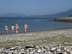 Supporters of the 19th annual Wreck Beach Bare Buns Run gathered at Sunset Beach in Vancouver on Thursday, August 13, 2015 to promote the upcoming run which will take place on August 16 at noon on Wreck Beach.