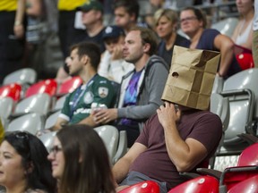 Fans of the Vancouver Whitecaps began wearing paper bags to B.C. Place Stadium this season. The MLS squad, like the rest of the pro teams in Vancouver, are going through some miserable times.