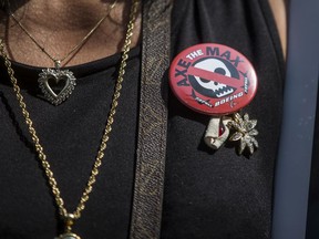 Clariss Moore wears a button calling for the Boeing 737 MAX 8 to be grounded during a vigil for victims of the Ethiopian Airlines Flight ET302 crash on September 10, 2019 in Washington, DC. The March 10, 2019 crash killed 157 people.