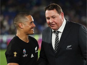 New Zealand's Aaron Smith shakes hands with his coach, Steve Hansen, after the Rugby World Cup 2019 Group B game between New Zealand and South Africa at International Stadium Yokohama on September 21, 2019 in Yokohama, Kanagawa, Japan.