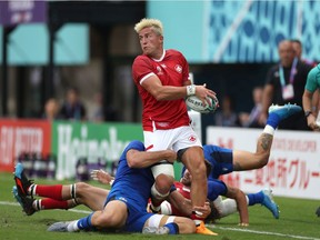 DTH Van Der Merwe of Canada breaks tthrough the Italy defence during the Rugby World Cup 2019 Group B game between Italy and Canada at Fukuoka Hakatanomori Stadium on September 26, 2019 in Fukuoka, Japan.