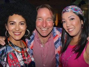 Staffers Tamila Khayrullaeva, James Cooper and Mary Lam orchestrated the '70s theme fundraiser. Photo: Fred Lee.