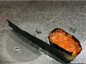 Battleship roll (gunkan) with ikura (salmon roe) at Sushi Bar Shu.