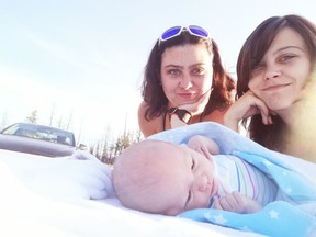 Mom Shaiyena Currie, right, with 3-day-old baby Octavia and her sister Chelsea Currie on their way home to Bella Coola from Williams Lake after three weeks of living in a tent waiting for the birth.