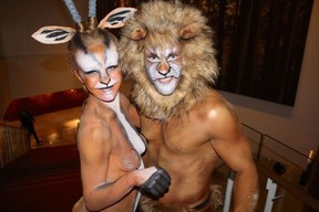 Body painted models Chelsea Brennan and Levi James welcomed guests to the Serengeti-themed afternoon soiree. Photo Fred Lee.