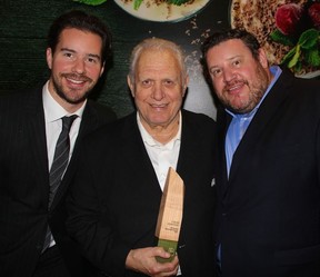 The Heras family’s 7 Seas Seafood was inducted into the BCFB Hall of Fame. Flanked by sons Nick and George, John Heras founded the Vancouver Fish Company in 1967. Photo Fred Lee.