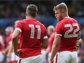 DTH Van Der Merwe (L), and Conor Trainor of Canada talking at the end of the 2015 Rugby World Cup Pool D match between Italy and Canada at Elland Road on Sept. 26, 2015 in Leeds, England.