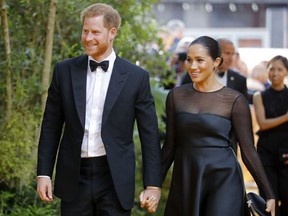 Britain's Prince Harry, Duke of Sussex and Britain's Meghan, Duchess of Sussex arrive for the European premiere of the film The Lion King in London on July 14, 2019.