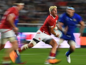 Canada winger DTH van der Merwe looks set to pass the ball during a run against Italy in Pool B play at the Rugby World Cup in Fukuoka, Japan, on Sept. 26, 2019. Italy beat Canada 48-7.
