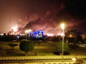 Smoke is seen following a fire at an Aramco factory in Abqaiq, Saudi Arabia, Sept. 14, 2019 in this picture obtained from social media.