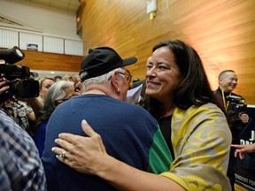 Former federal justice minister and current Independent MP Jody Wilson-Raybould embraces supporters after a rally in Vancouver on Sept. 18.