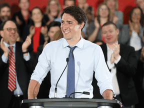 Prime Minister Justin Trudeau receives a standing ovation while addressing Liberal Party candidates in Ottawa, July 31, 2019.