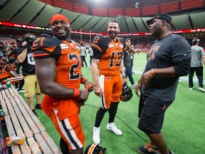 B.C. Lions quarterback Mike Reilly, centre, running back Brandon Rutley, left, and head coach DeVone Claybrooks will be looking to extend Montreal's 2-17 run at B.C. Place when they host the Alouettes Saturday night.