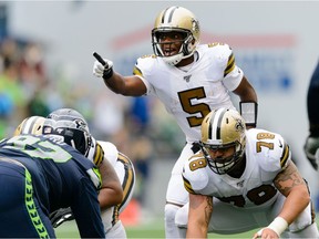 Sep 22, 2019; Seattle, WA, USA; New Orleans Saints quarterback Teddy Bridgewater (5) points to the Seattle Seahawks defense during the second half at CenturyLink Field. Mandatory Credit: Steven Bisig-USA TODAY Sports