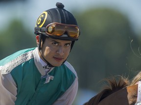Jockey Mario Gutierrez eyes the photographer during B.C. Cup day at Hastings Racecourse in 2013.