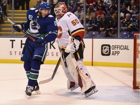 Josh Leivo (left), in pre-season action against the Calgary Flames just over a year ago, is the third former Canuck to make the trip over the Rockies and join Vancouver’s rival.