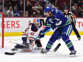 Vancouver Canucks forward Brandon Sutter (20) scores on a penalty shot against Edmonton Oilers goaltender Shane Starrett (40) during the first period at Rogers Arena.