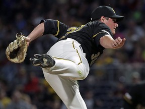 Pittsburgh Pirates relief pitcher Kyle Crick delivers during the eighth inning of a game against the San Diego Padres in Pittsburgh, Friday, June 21, 2019. (AP Photo/Gene J. Puskar)