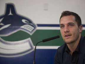 Bo Horvat, considered to be the prime candidate for wearing the C if the Canucks have a captain this season, speaks with reporters in Vancouver on Thursday. The NHL team opens training camp Friday in Victoria.