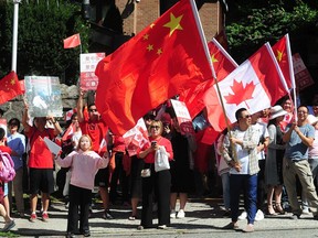 Scenes from a rally outside the Chinese consulate to protest against "police brutality" against pro-Hong Kong supporters by police in Hong Kong as well as pro China demonstrators, in Vancouver Aug. 18, 2019.