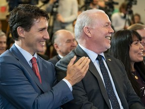 Prime Minister Justin Trudeau and B.C. Premier John Horgan at last fall's LNG funding announcement: The bromance continues as Trudeau seeks re-election a year later.