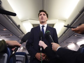 Liberal Leader Justin Trudeau makes a statement in regards to photo coming to light of himself from 2001 wearing "brownface" during a scrum on his campaign plane in Halifax.